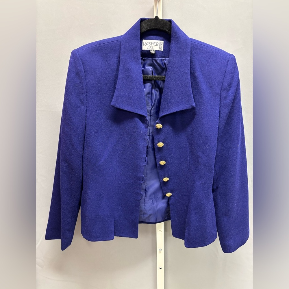 Women’s purple jacket with great gold buttons
